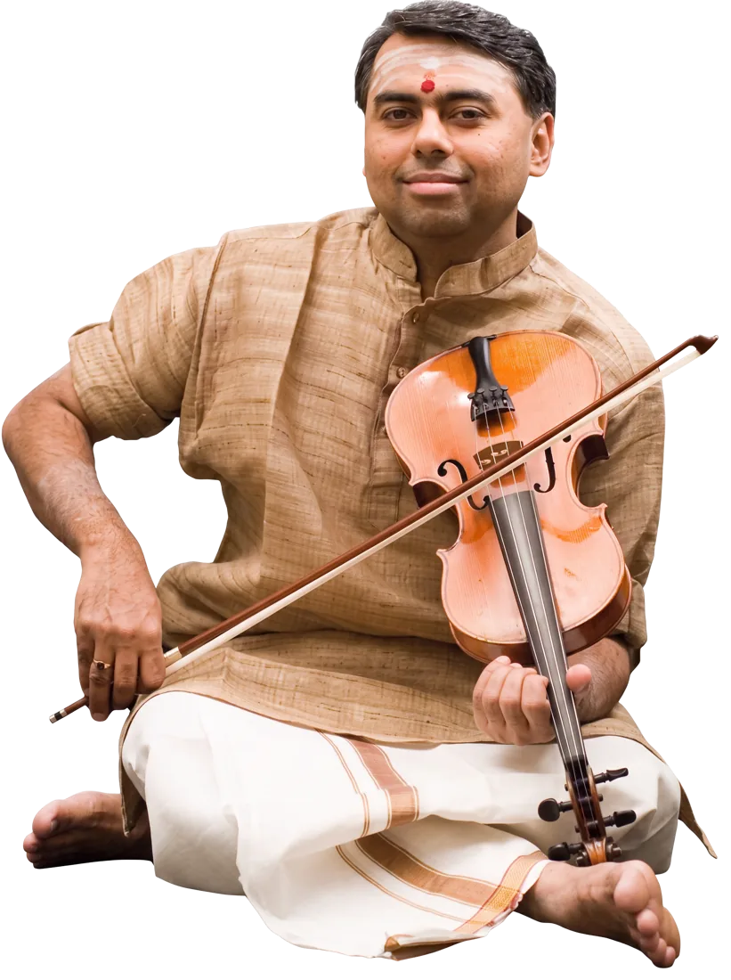 Sangita Kalanidhi Vidvan R K Shriramkumar seated with his violin